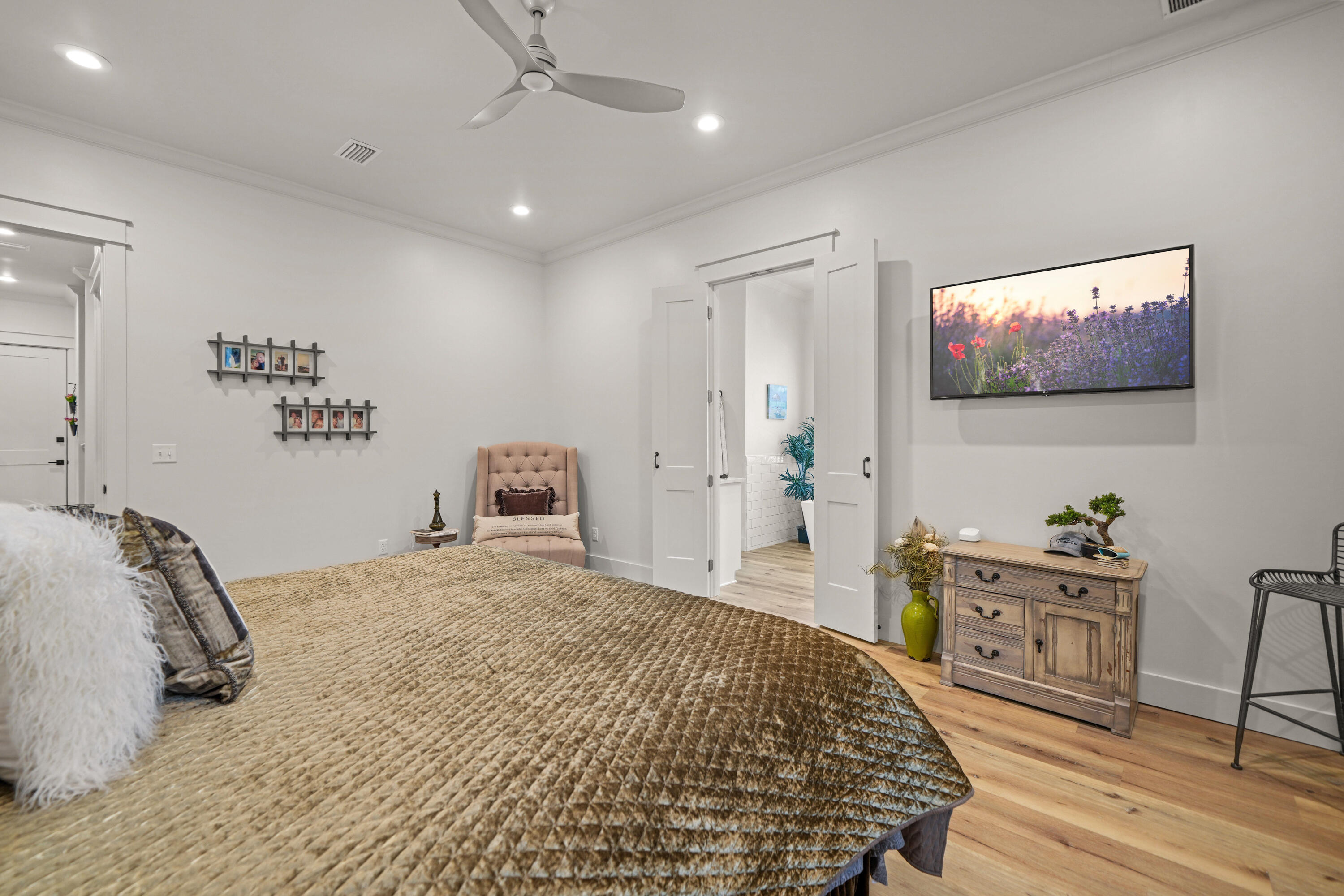 279 Smith Drive Santa Rosa Beach, FL 32459 - Photo 21 of 56 a bedroom with a bed and a flat screen tv