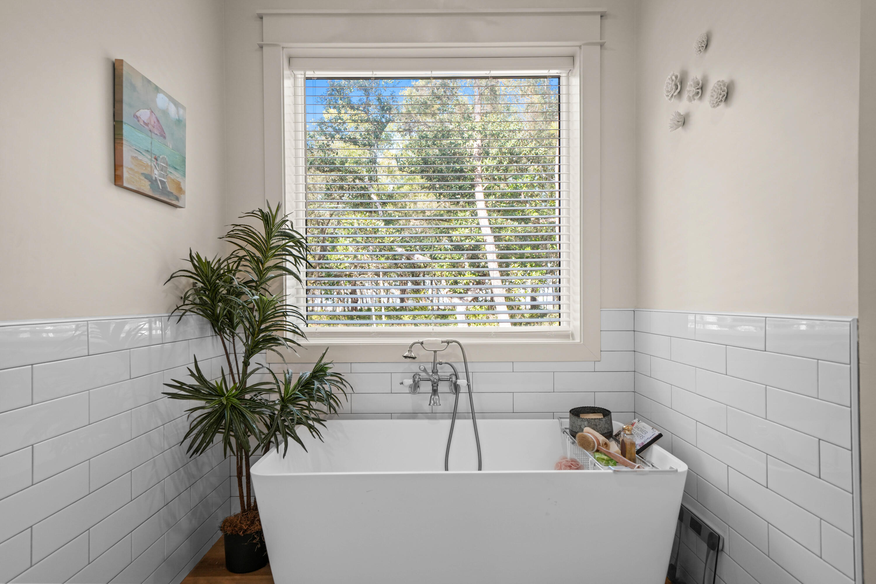 279 Smith Drive Santa Rosa Beach, FL 32459 - Photo 23 of 56 a bath tub sitting in a bathroom next to a window