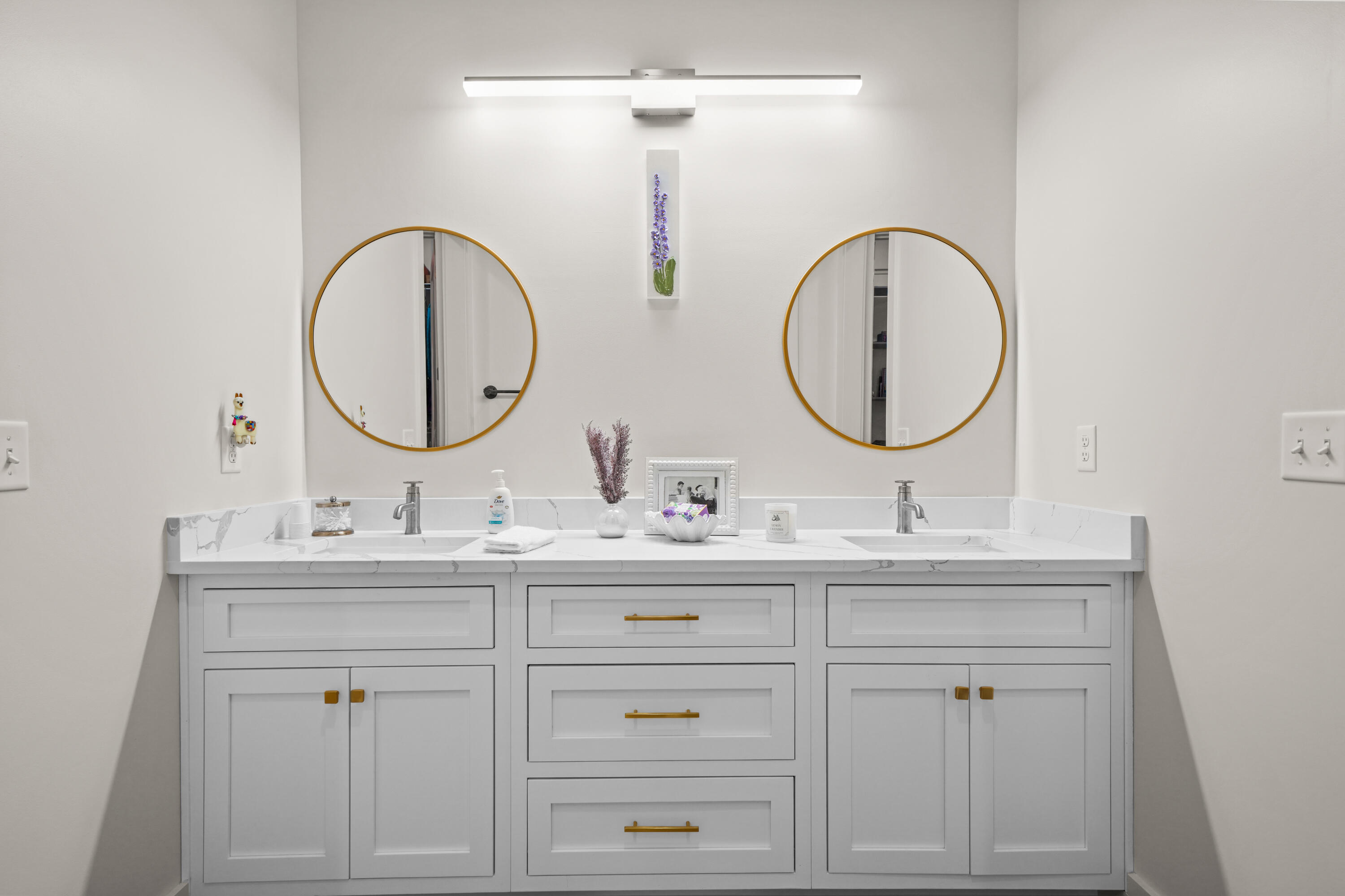 279 Smith Drive Santa Rosa Beach, FL 32459 - Photo 35 of 56 a bathroom with a double vanity sink and a mirror