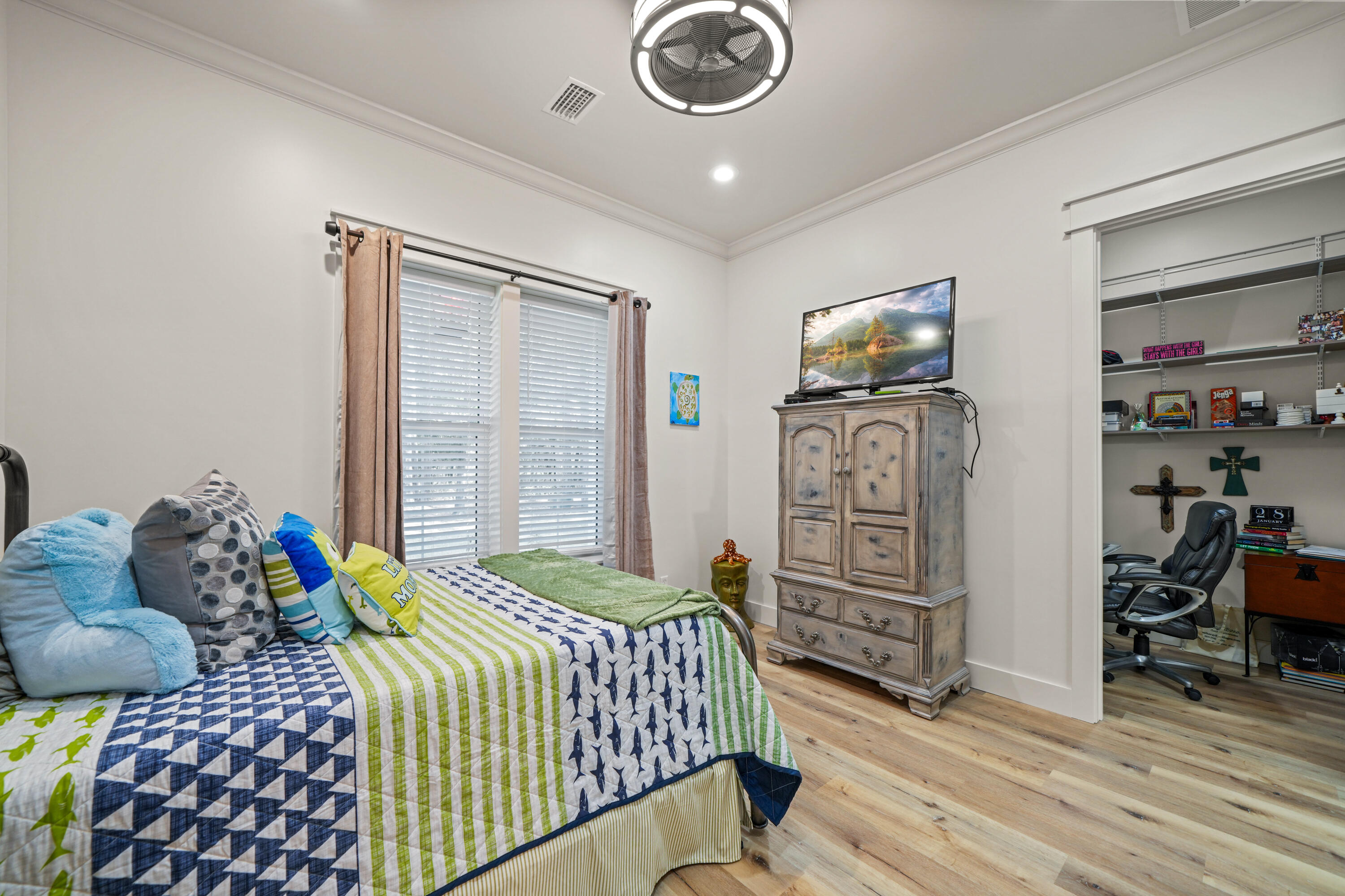 279 Smith Drive Santa Rosa Beach, FL 32459 - Photo 38 of 56 a bedroom with a bed and wooden floor