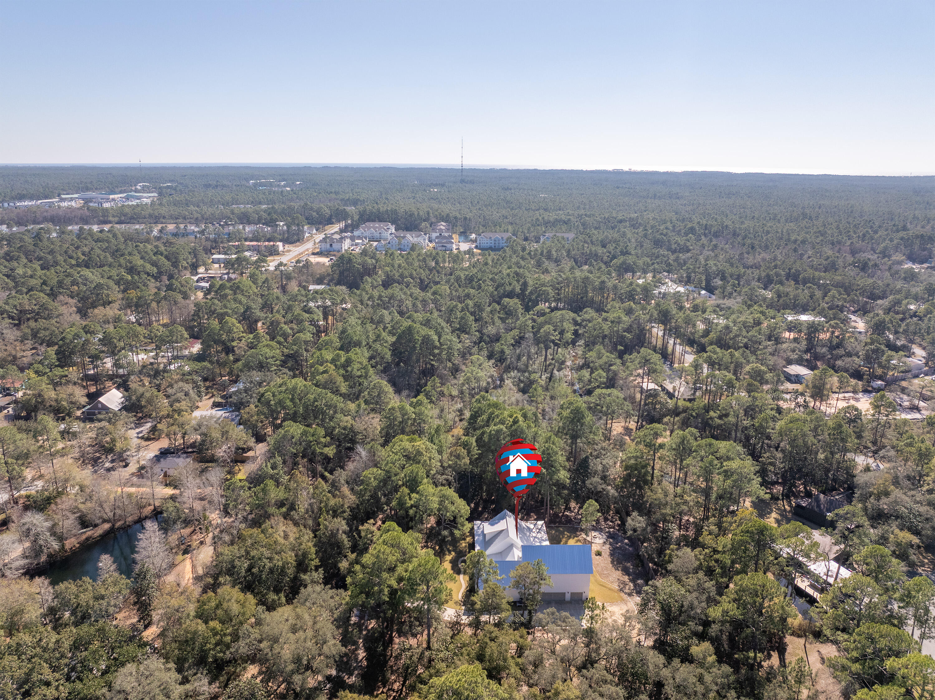 279 Smith Drive Santa Rosa Beach, FL 32459 - Photo 47 of 56 an aerial view of house with yard and mountain in the background