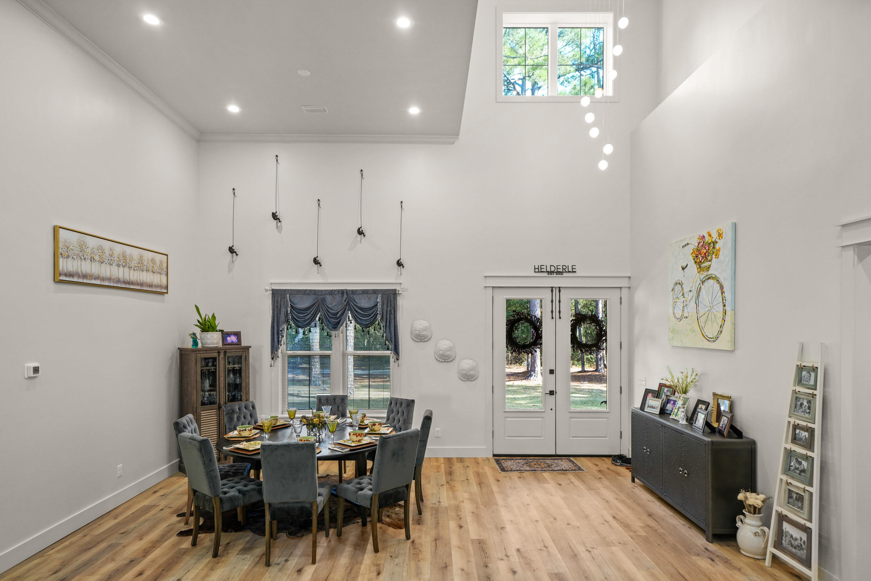 279 Smith Drive Santa Rosa Beach, FL 32459 - Photo 5 of 56 a view of a dining room with furniture and wooden floor