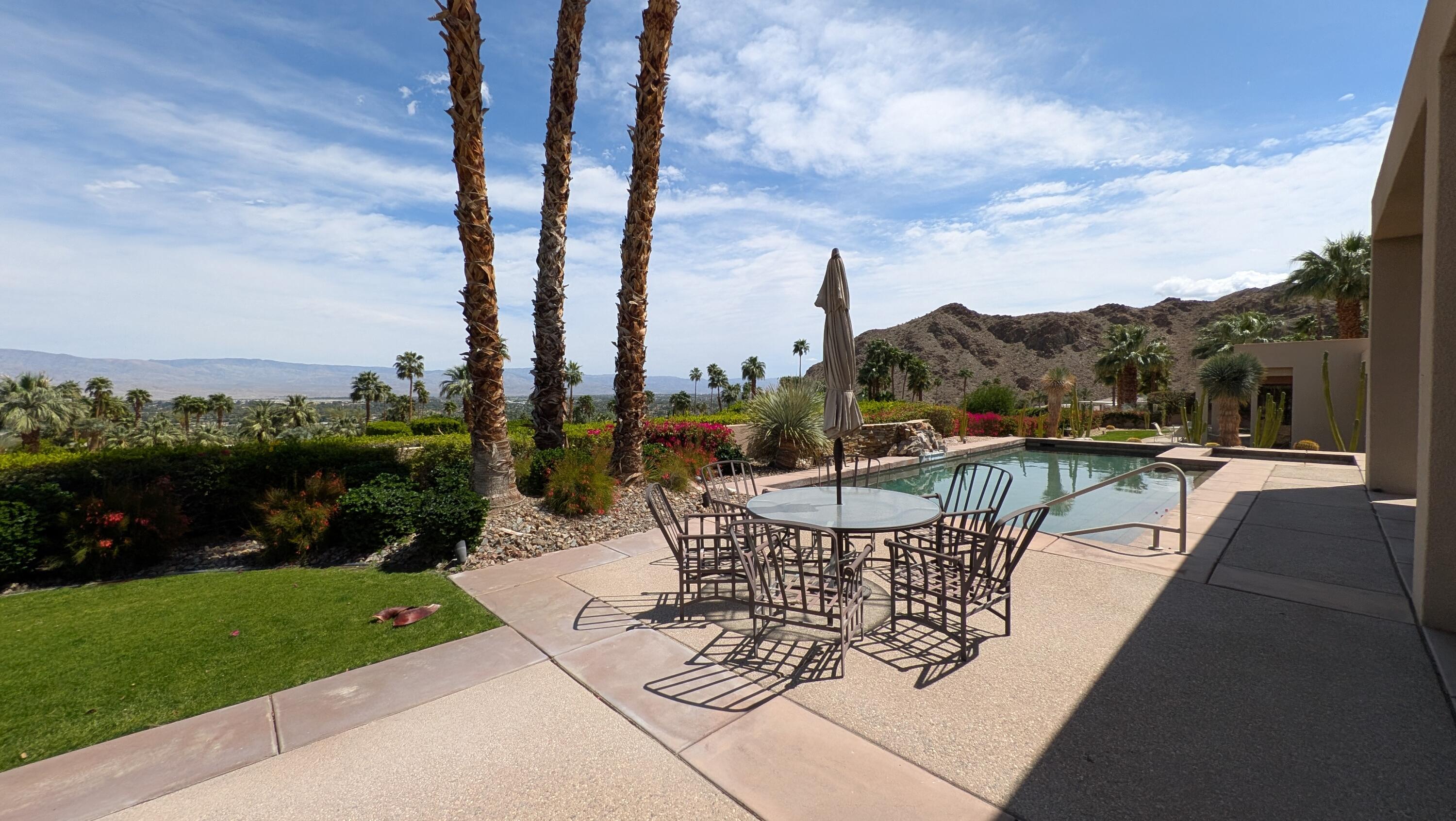 70250 Thunderbird Road Rancho Mirage, CA 92270 - Photo 2 of 2 a view of a terrace with sitting area