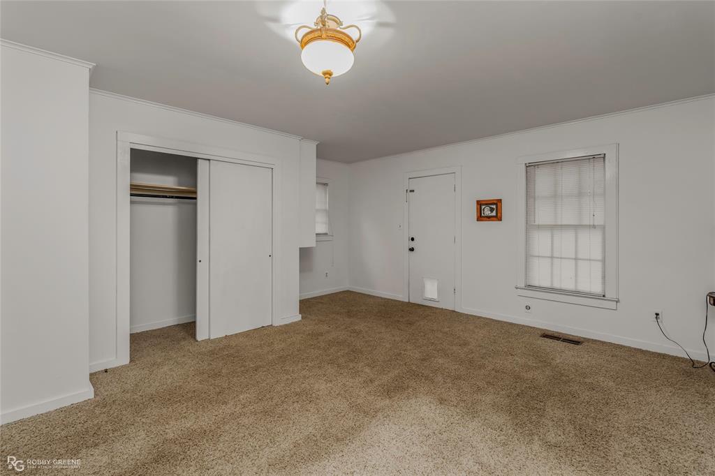 515 Davis Street Minden, LA 71055 - Photo 20 of 28 a view of an empty room with a window