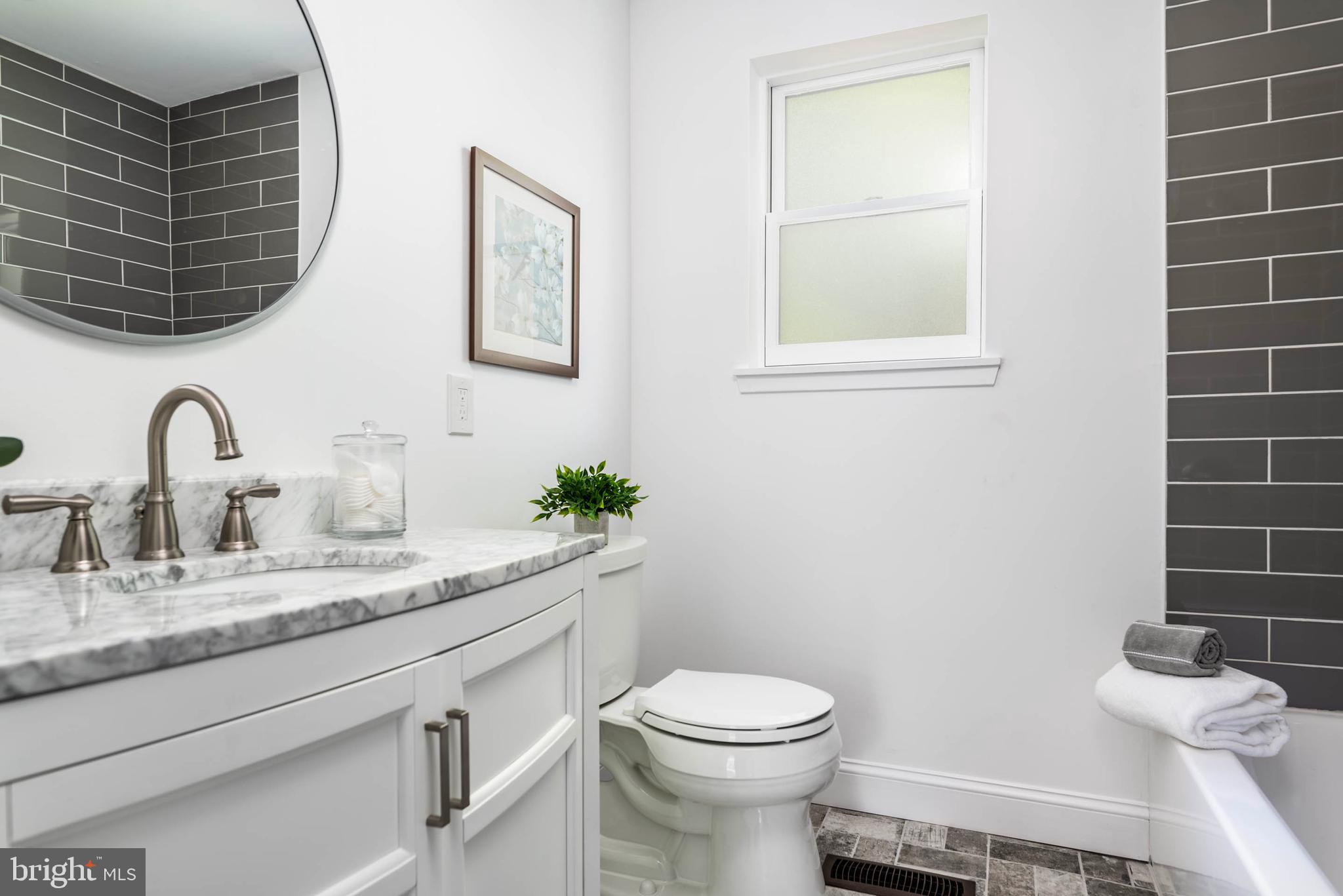 907 Twyckenham Road Media, PA 19063 - Photo 26 of 41 Renovated Hall Bath