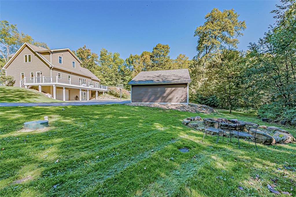 3057 County Line Road New Castle, PA 16101 - Photo 22 of 24 a front view of a house with a garden