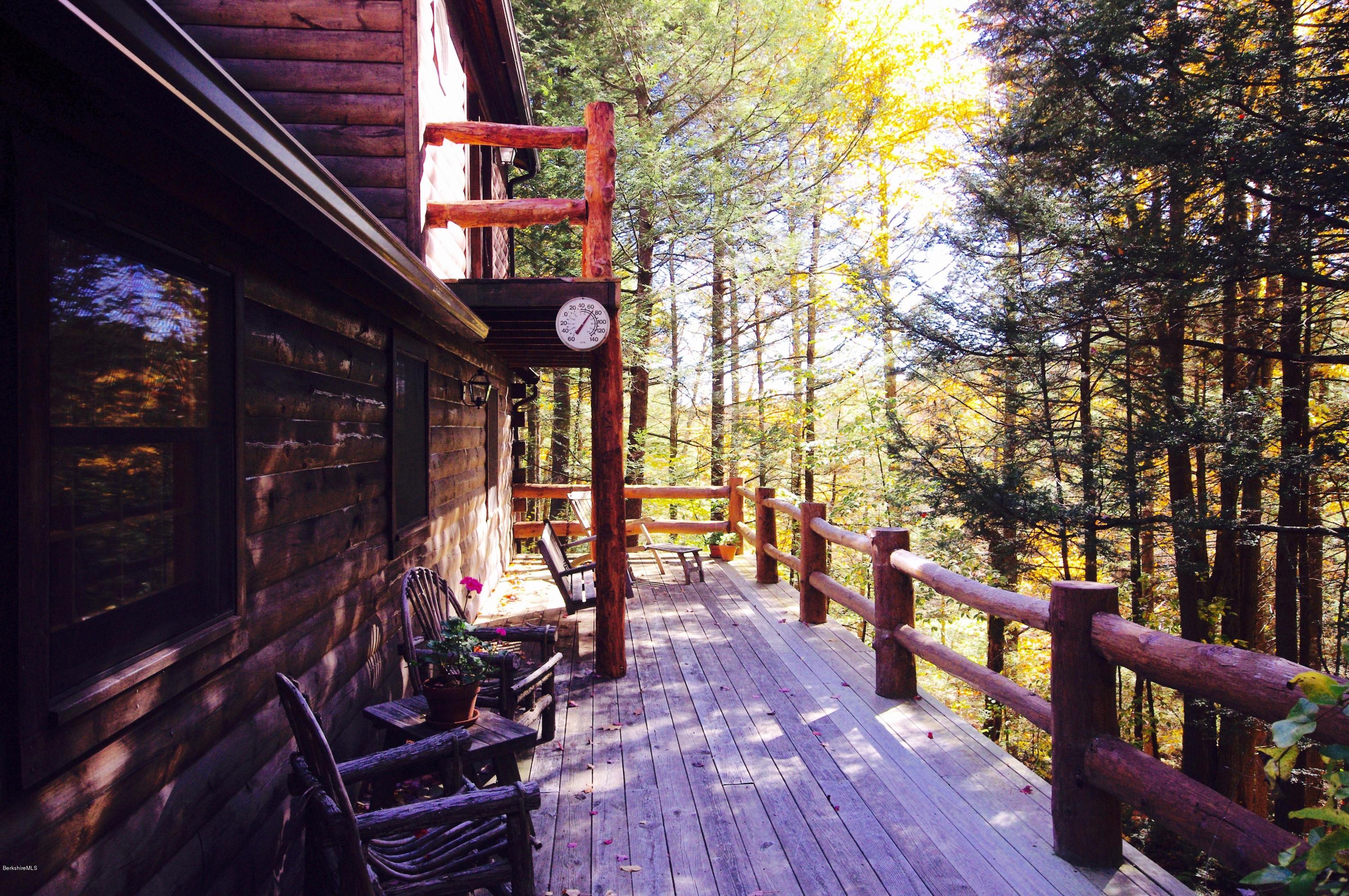 157 Chipman Road Middlefield, MA 01011 - Photo 10 of 11 a view of an chairs and floor in the balcony