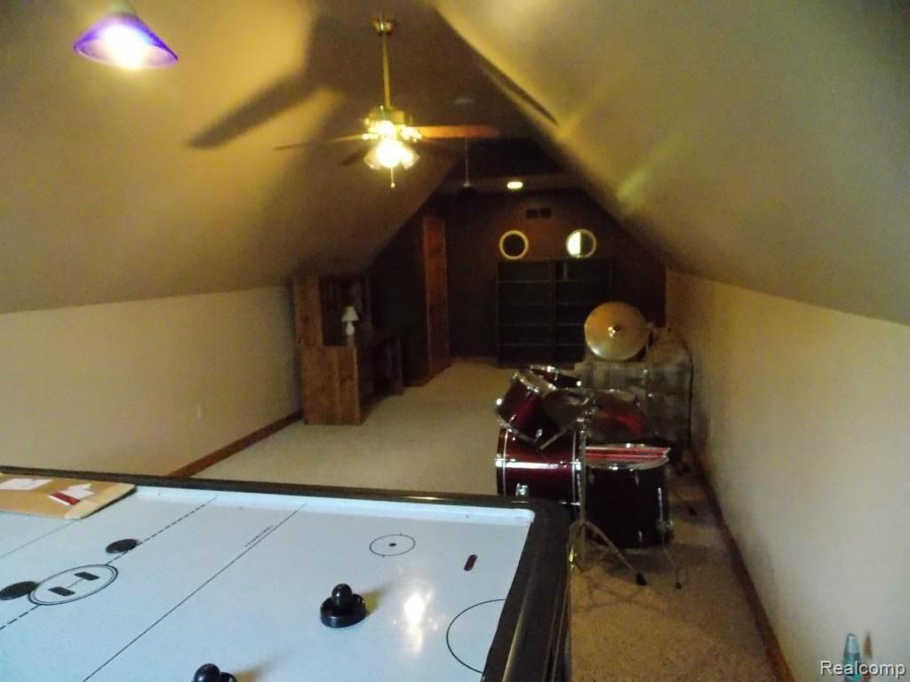 2974 Hannan Road Imlay City, MI 48444 - Photo 25 of 45 The large recreation room has a closet, if there were ever a need for an extra bedroom.