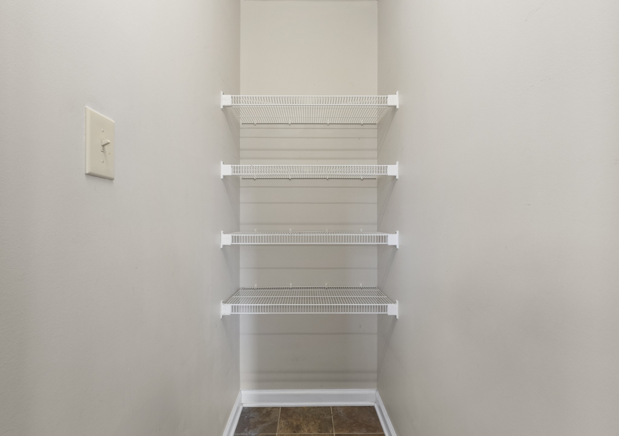 620 Wolfchase Drive Clarksville, TN 37042 - Photo 14 of 24 a view of walk in closet with empty racks