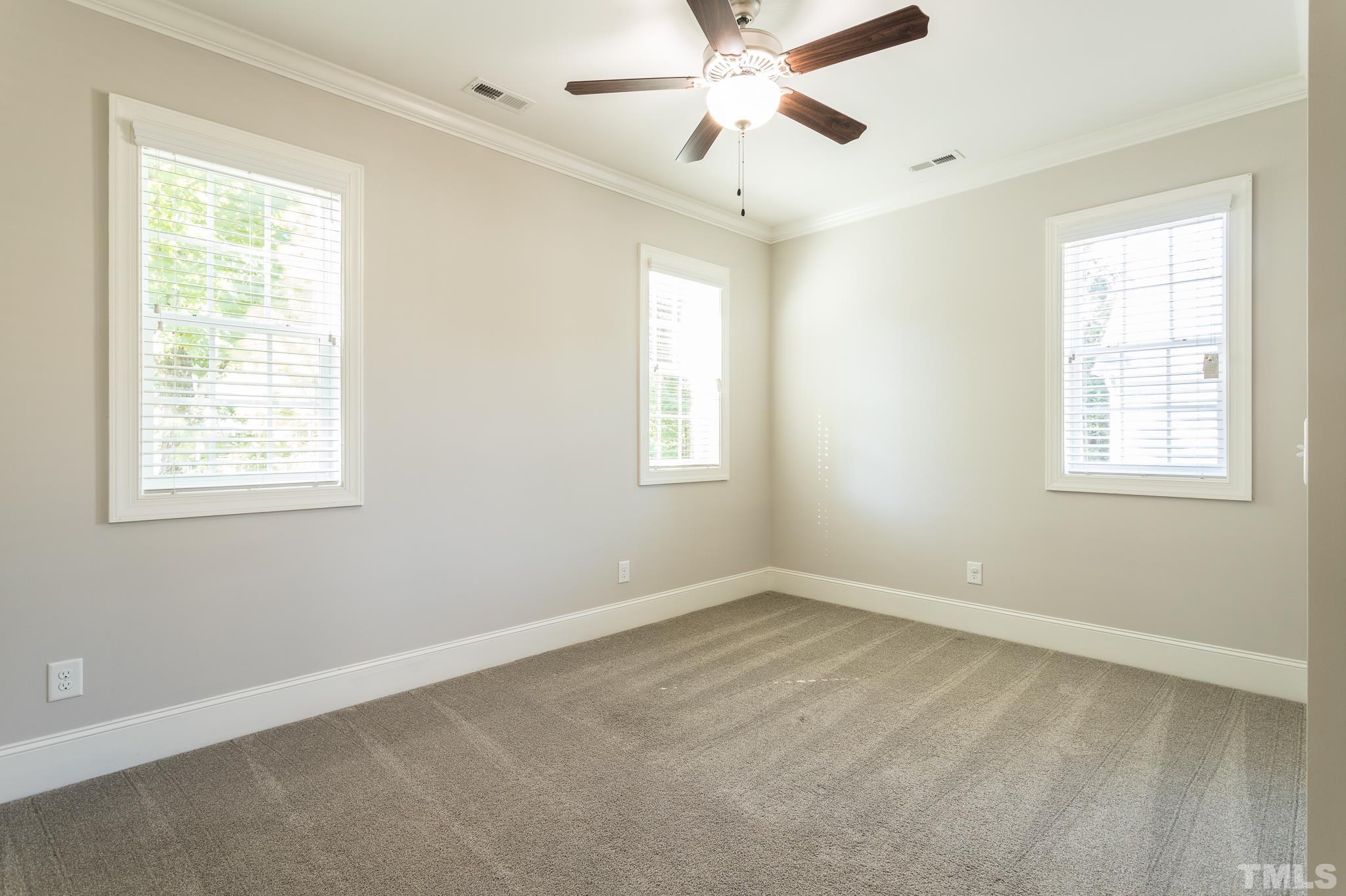 2809 Plumfield Place Raleigh, NC 27607 - Photo 12 of 25 a view of an empty room with a window