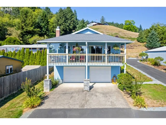 a balcony with a garden and furniture