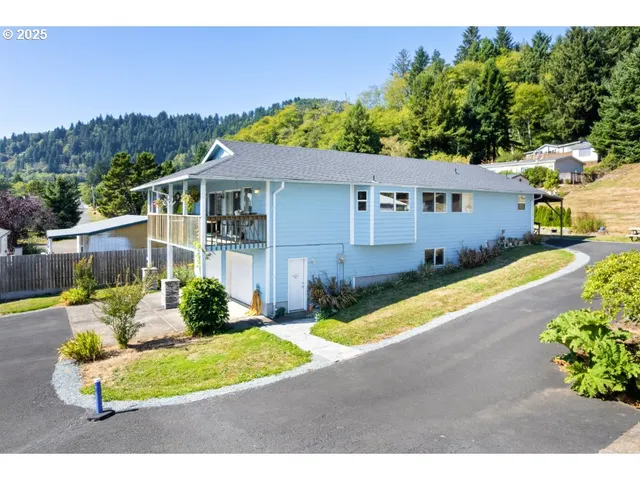 a view of a house with a swimming pool