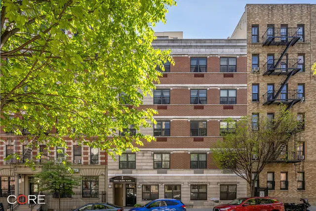 a kitchen with a sink a stove and cabinets