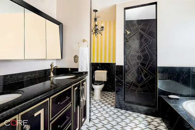 a bedroom with a bed and a table in it