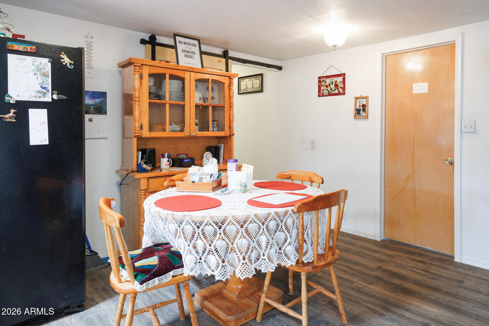 6185 East Monitor Street Picacho, AZ 85141 - Photo 50 of 55 a dining room with furniture and wooden floor