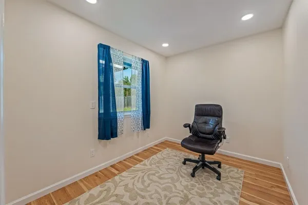 a room with furniture and a window