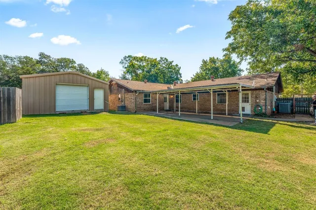 a view of a house with a swimming pool