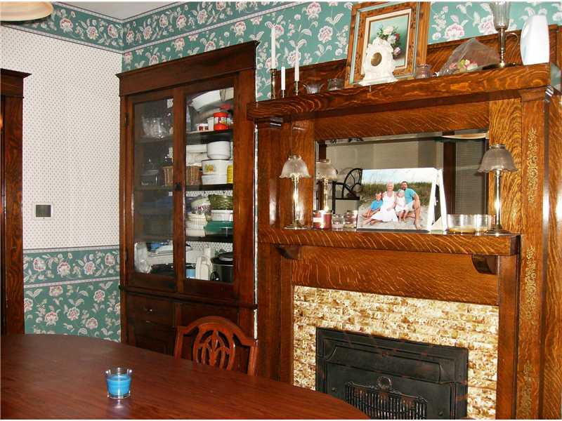 419 Ohio Avenue Rochester, PA 15074 - Photo 7 of 25 Dining Room. ~Cozy Fireplace and Built-In Hutch in the Dining Room!~