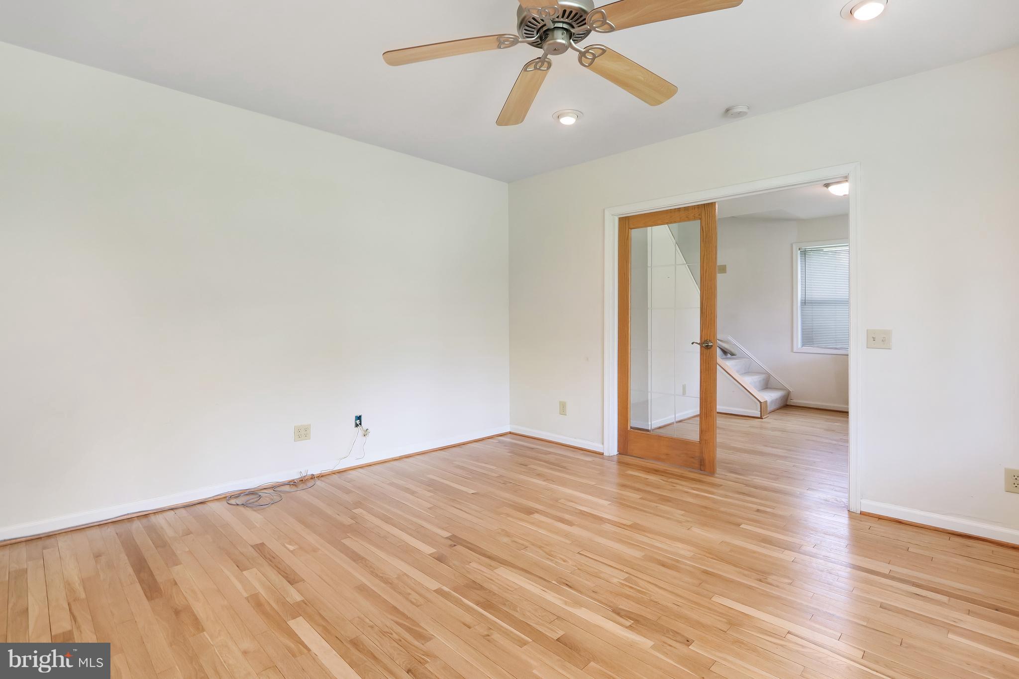 3102 Rices Lane Baltimore, MD 21244 - Photo 4 of 30 Living Room has wood floors & ceiling fan