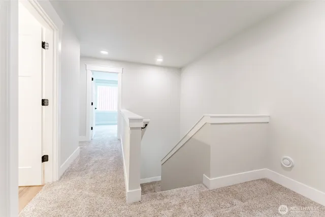 a view of a hallway with closet