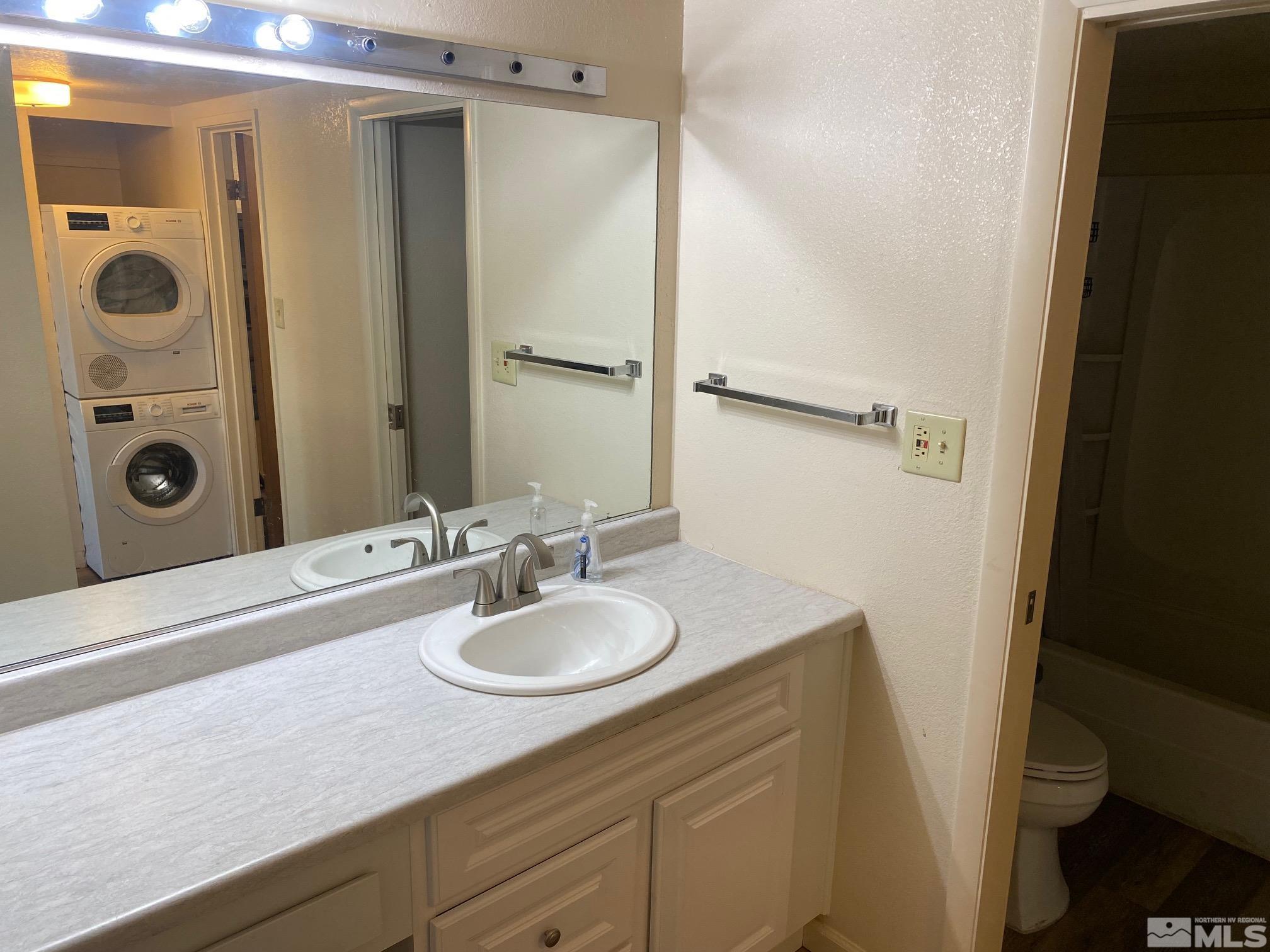 83 Vista Rafael Parkway, Unit 83 Reno, NV 89503 - Photo 12 of 16 a bathroom with a sink and a mirror