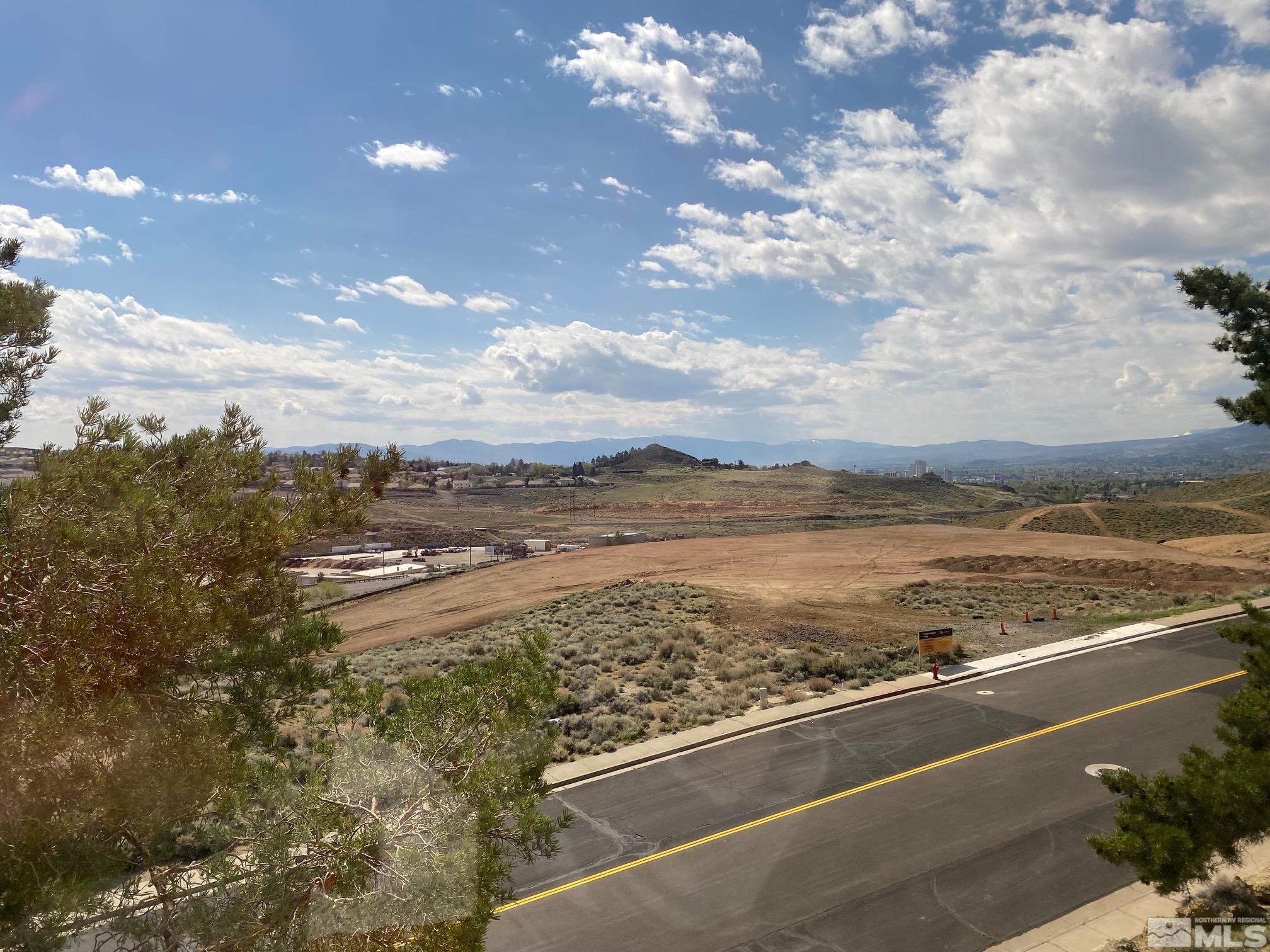 83 Vista Rafael Parkway, Unit 83 Reno, NV 89503 - Photo 14 of 16 a view of a sky from a balcony
