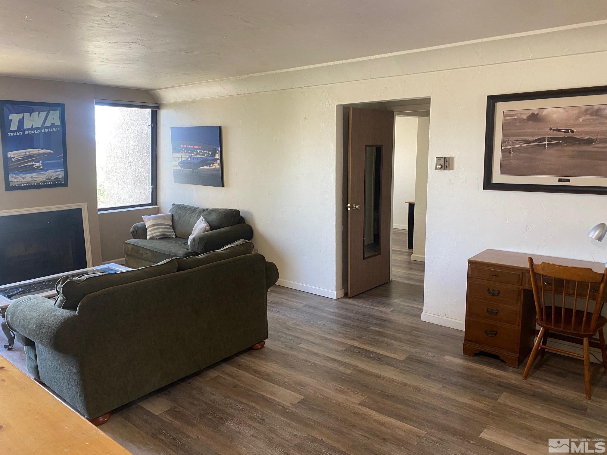 83 Vista Rafael Parkway, Unit 83 Reno, NV 89503 - Photo 2 of 16 a living room with furniture and a window