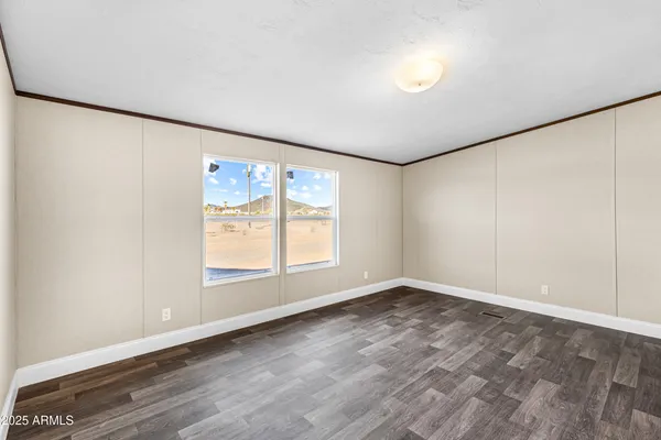 a bathroom with a shower and a shower head