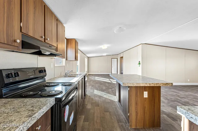 a bathroom with a toilet a sink and bathtub
