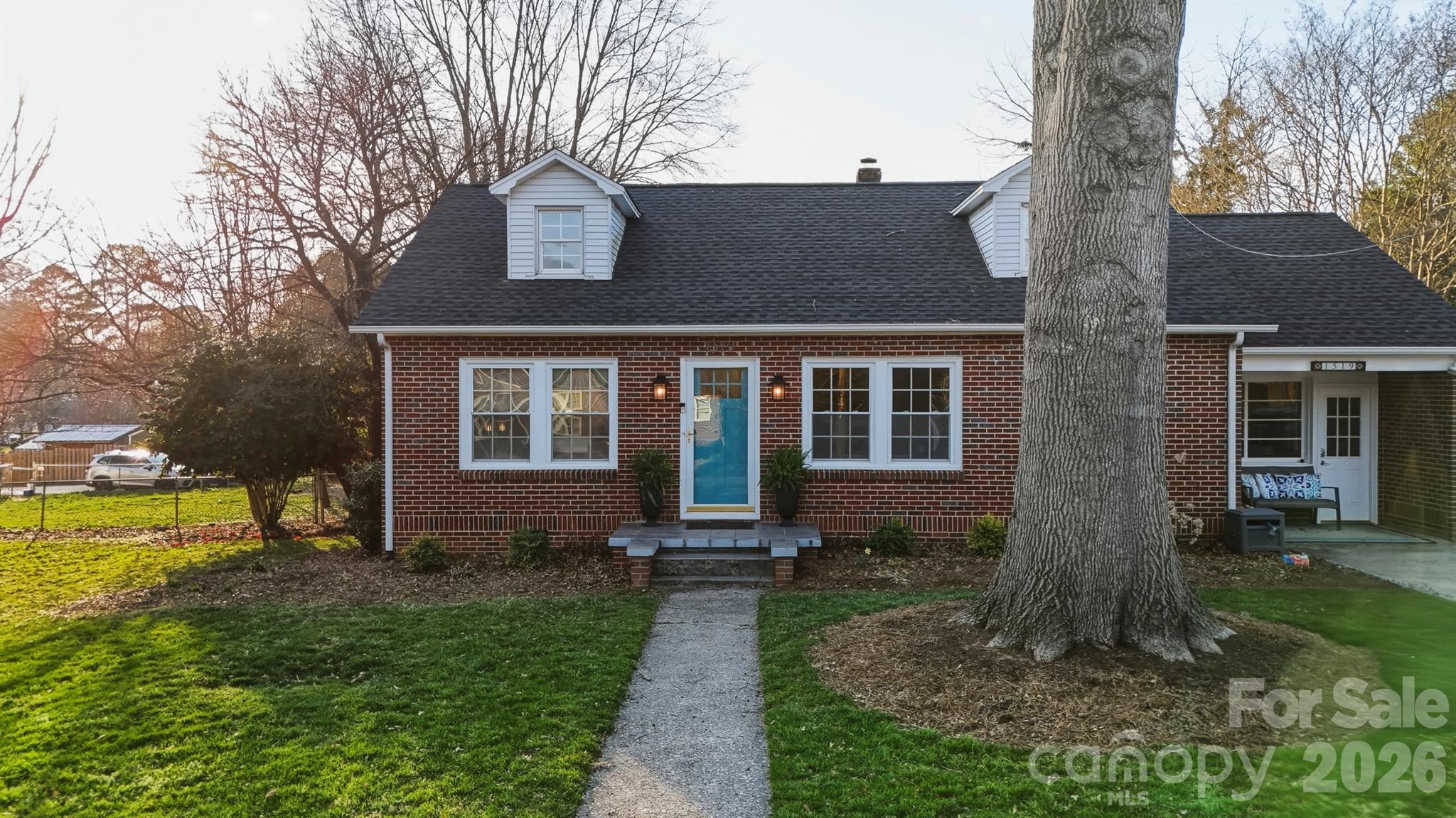 1519 3rd Street Northwest Hickory, NC 28601 - Photo 12 of 48 front view of house with a yard