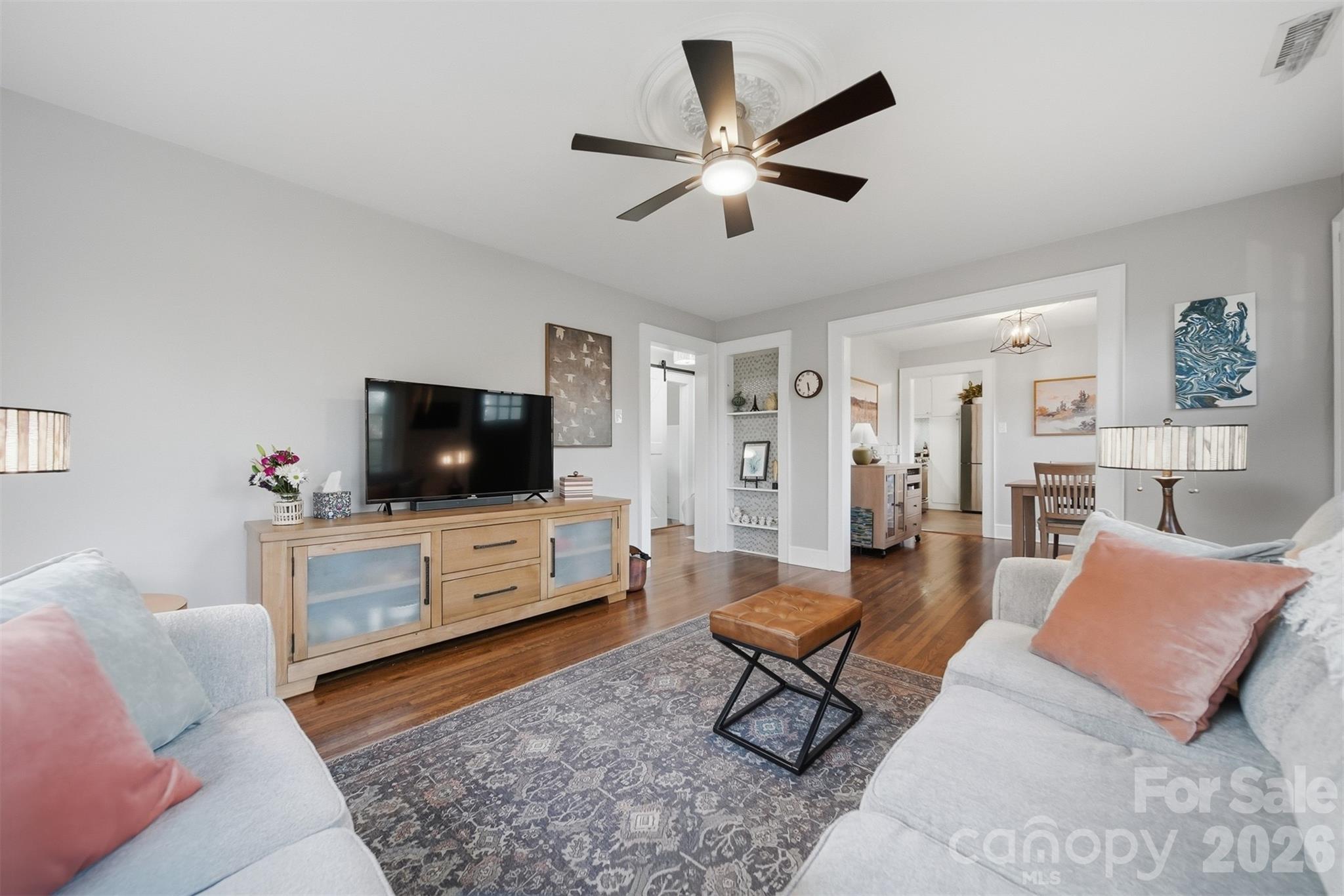 1519 3rd Street Northwest Hickory, NC 28601 - Photo 15 of 48 a living room with furniture and a flat screen tv