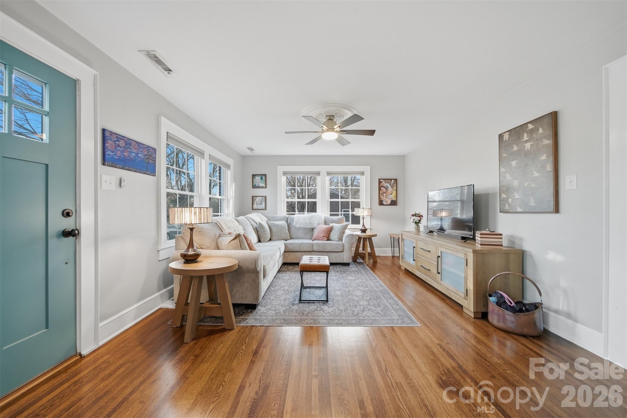 1519 3rd Street Northwest Hickory, NC 28601 - Photo 16 of 48 a living room with furniture and a wooden floor