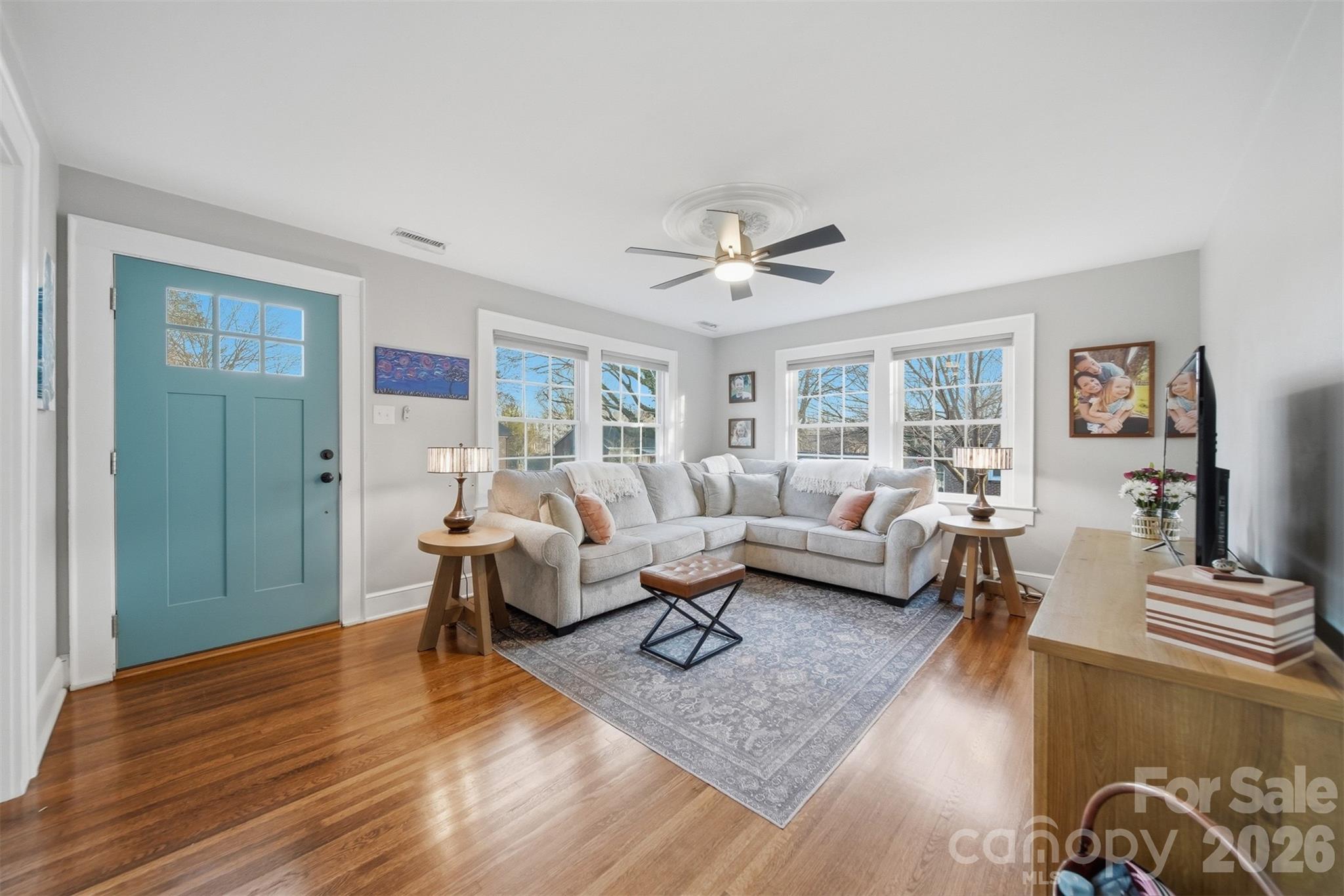 1519 3rd Street Northwest Hickory, NC 28601 - Photo 2 of 48 a living room with furniture or wooden floor and a large window