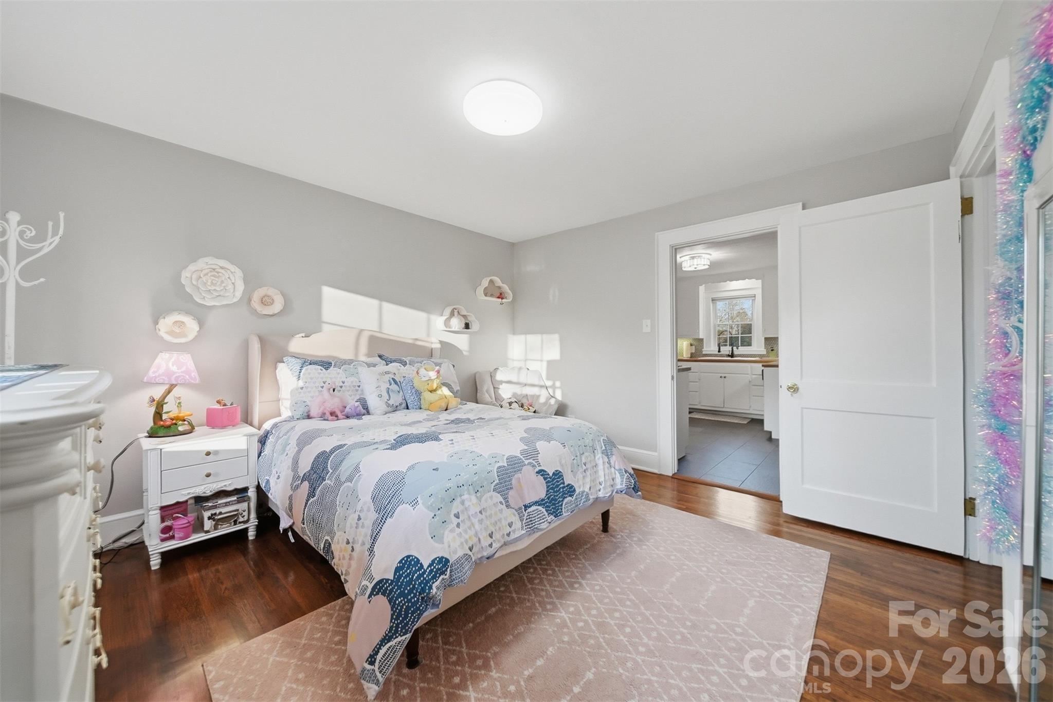 1519 3rd Street Northwest Hickory, NC 28601 - Photo 21 of 48 a bedroom with a bed and a view of bathroom