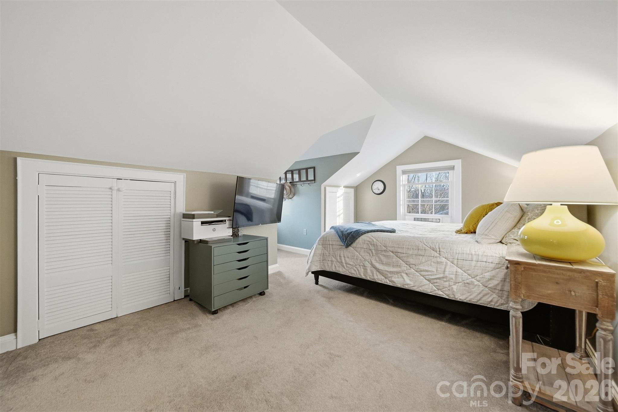 1519 3rd Street Northwest Hickory, NC 28601 - Photo 29 of 48 a bedroom with a bed and a couch