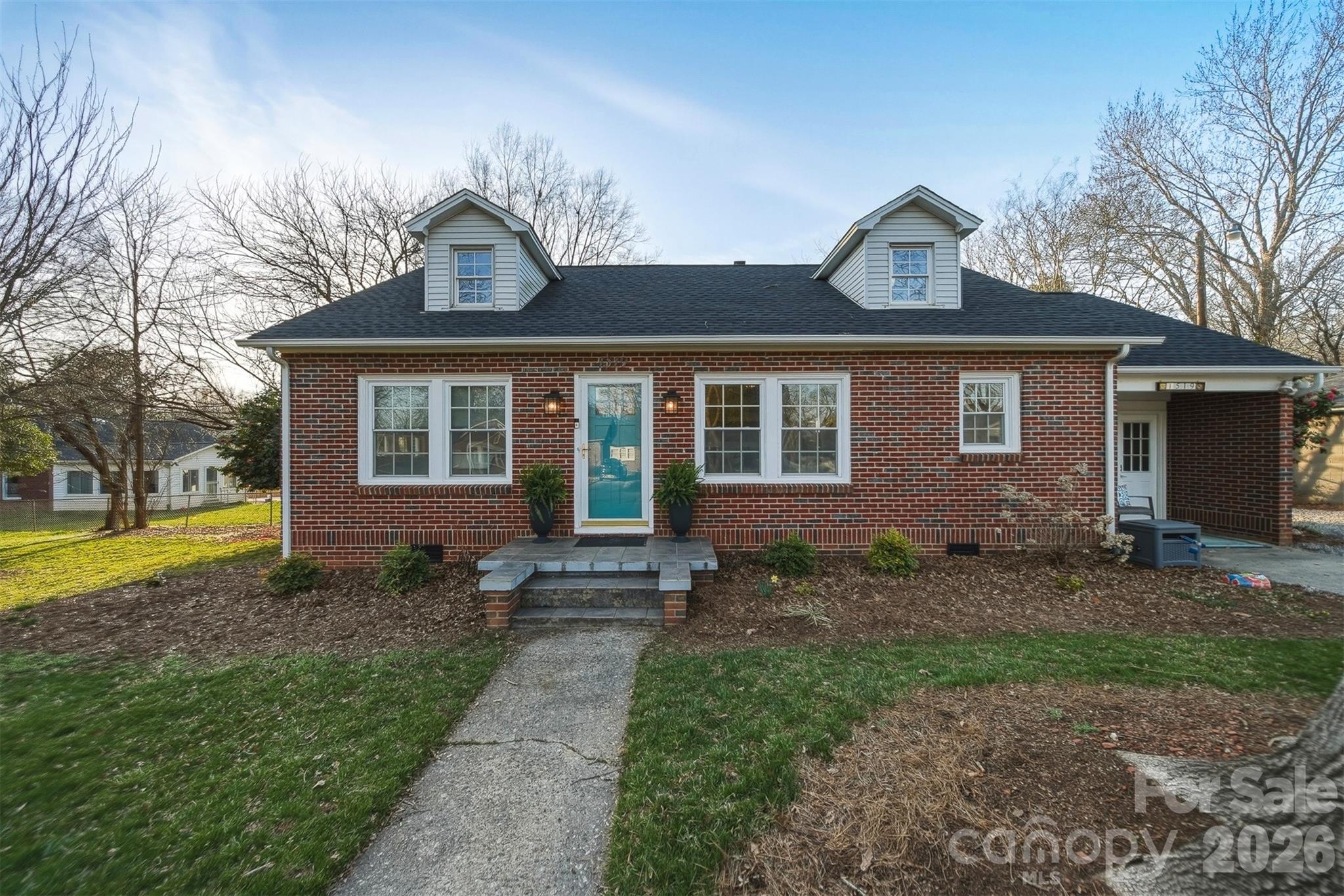 1519 3rd Street Northwest Hickory, NC 28601 - Photo 34 of 48 a front view of a house with garden