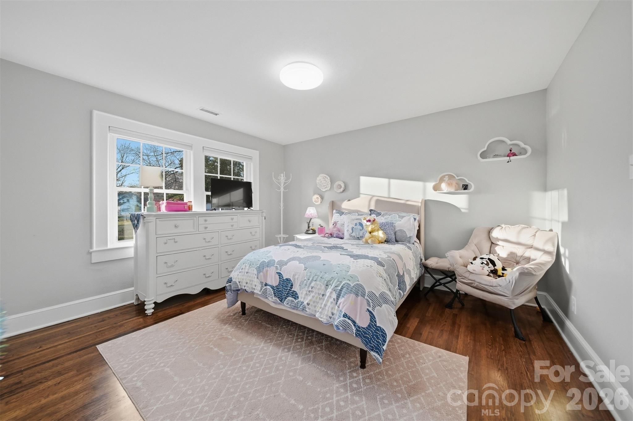 1519 3rd Street Northwest Hickory, NC 28601 - Photo 7 of 48 a bedroom with a bed and wooden floor