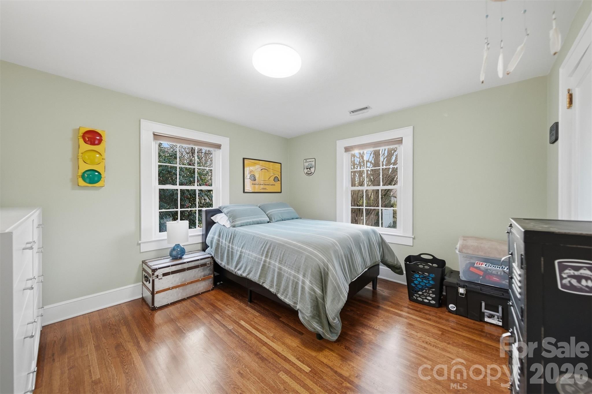 1519 3rd Street Northwest Hickory, NC 28601 - Photo 8 of 48 a spacious bedroom with a bed and a window