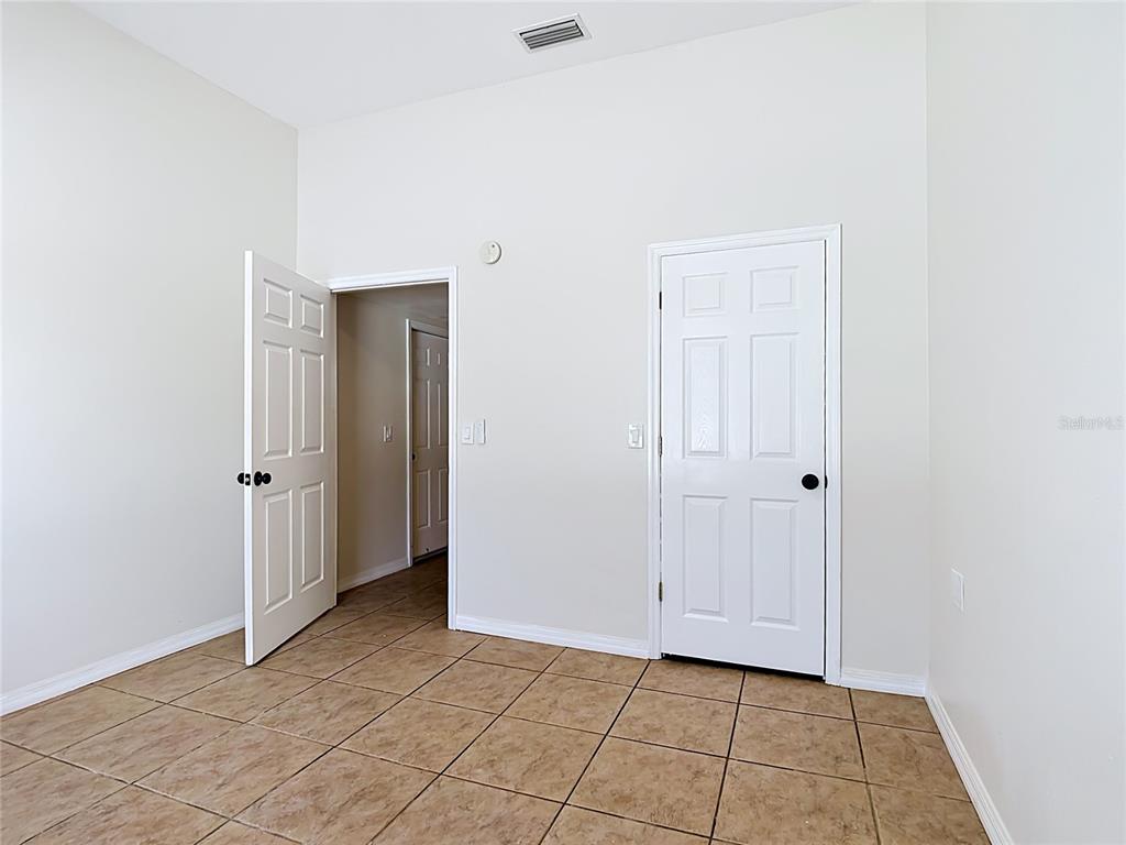 7925 Lake Mabel Loop Road Lake Wales, FL 33898 - Photo 72 of 97 a view of a livingroom with an empty space and a window