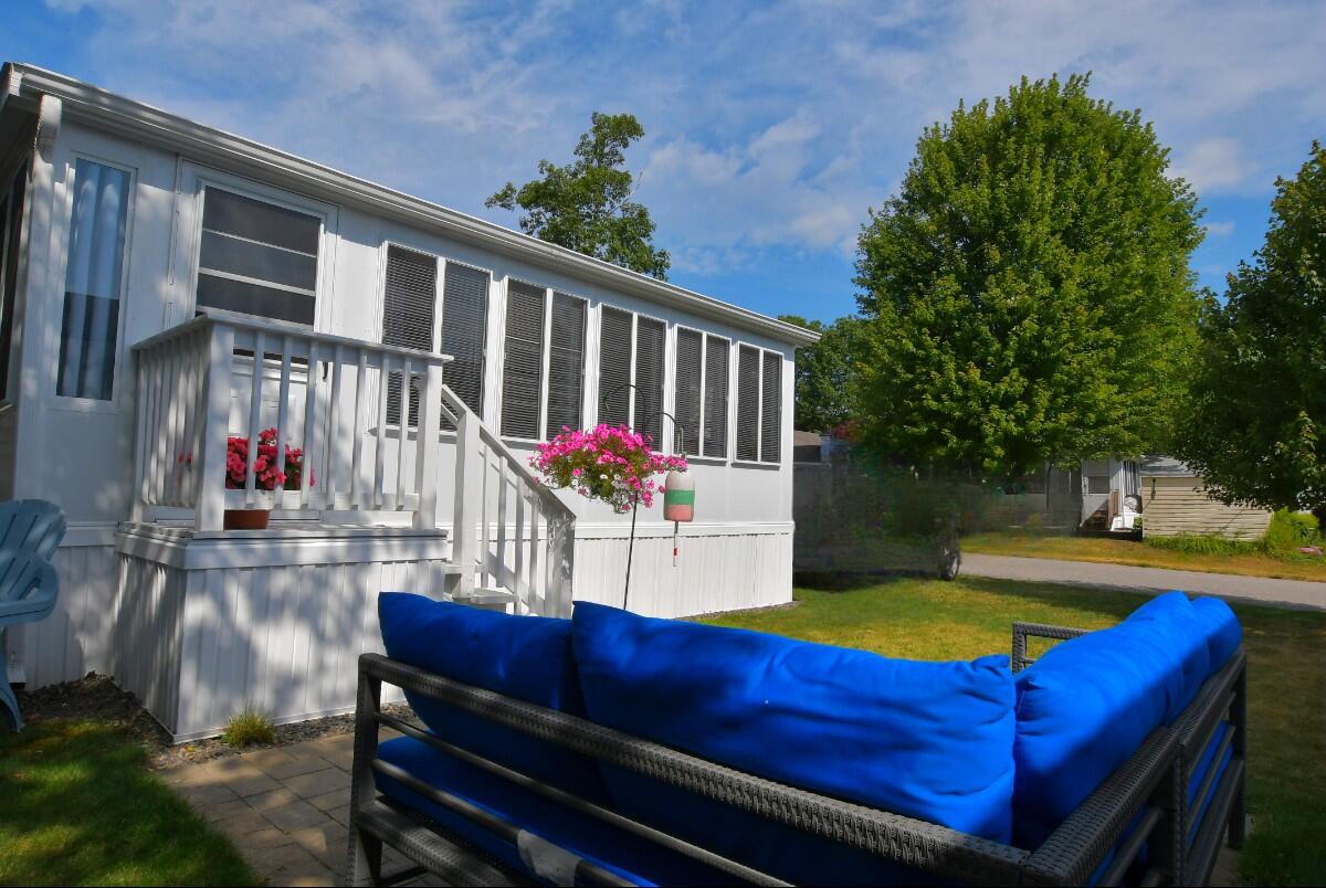 430 Post Road, Unit 169 Wells, ME 04090 - Photo 28 of 46 back of patio