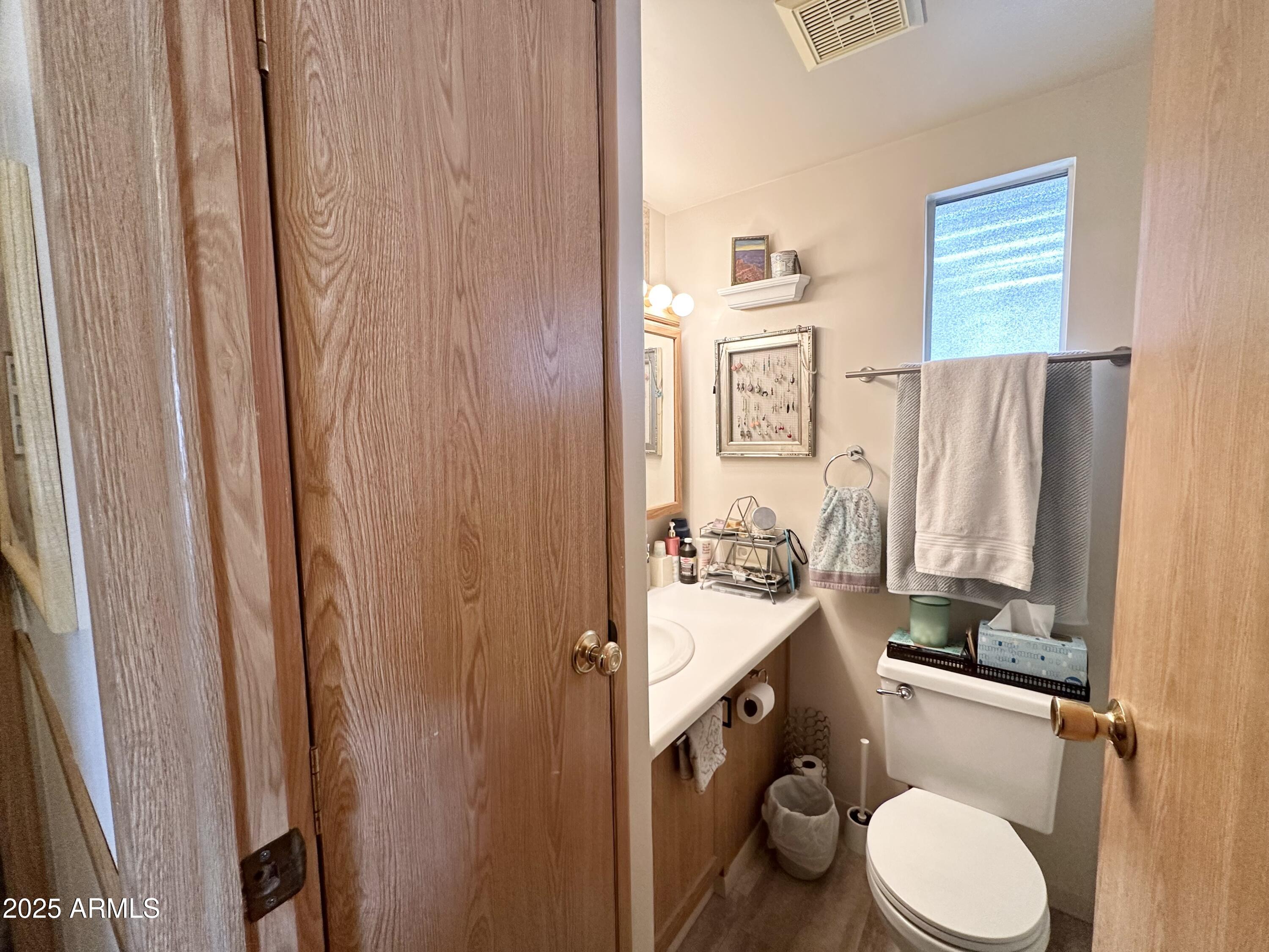 1027 South Prospectors Road Apache Junction, AZ 85119 - Photo 34 of 70 LINEN CLOSET IN BATHROOM
