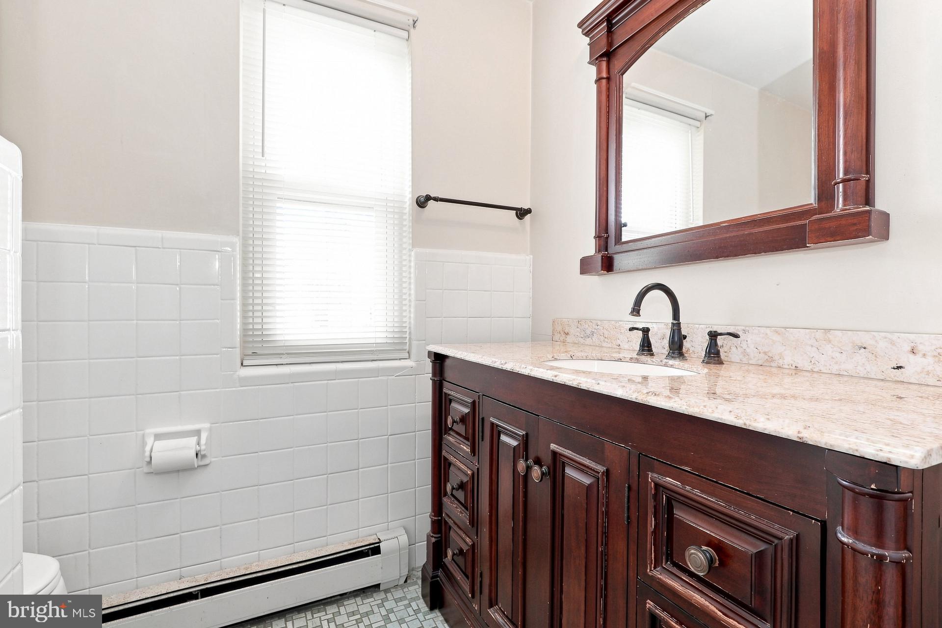 1007 Fairview Road, Unit D Swarthmore, PA 19081 - Photo 14 of 15 Elegant bathroom with classic charm.