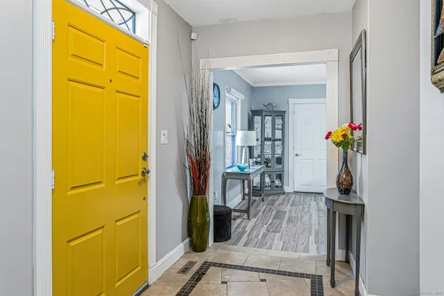 a view of a porch with wooden floor