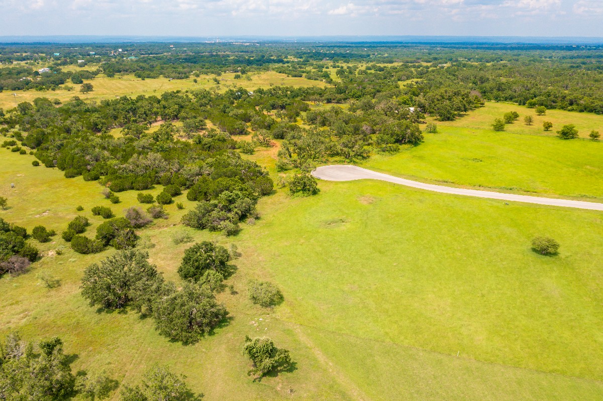 Lot 24 Lilly Lane Road Round Mountain, TX 78663 - Photo 4 of 14 a view of an ocean from a balcony
