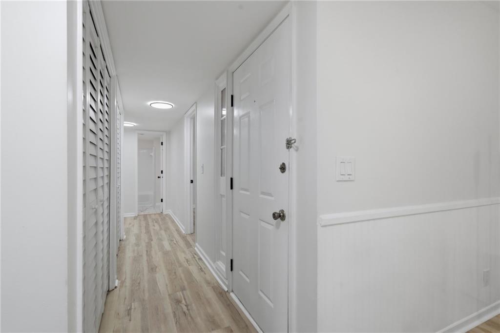 256 Quail Run, Unit 256 Roswell, GA 30076 - Photo 2 of 33 a view of a bathroom from the hallway