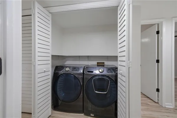 a utility room with dryer and washer