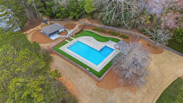 a view of an outdoor space with a swimming pool