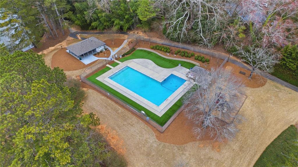 256 Quail Run, Unit 256 Roswell, GA 30076 - Photo 31 of 33 a view of an outdoor space with a swimming pool