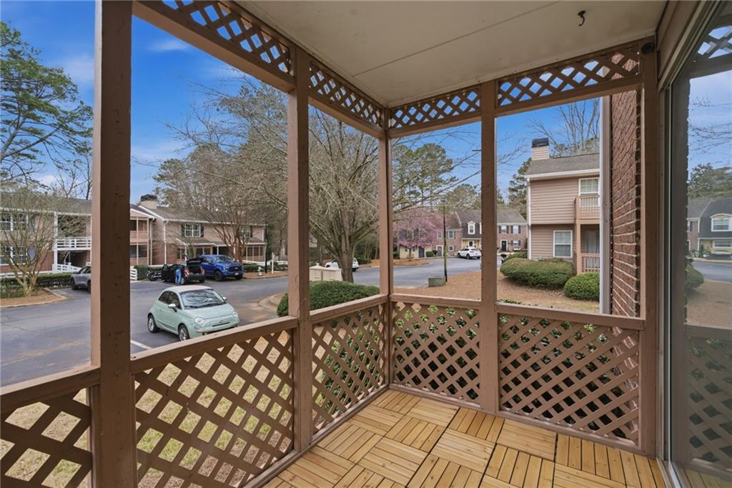 256 Quail Run, Unit 256 Roswell, GA 30076 - Photo 10 of 33 a view of a large window with the view of an outdoor space