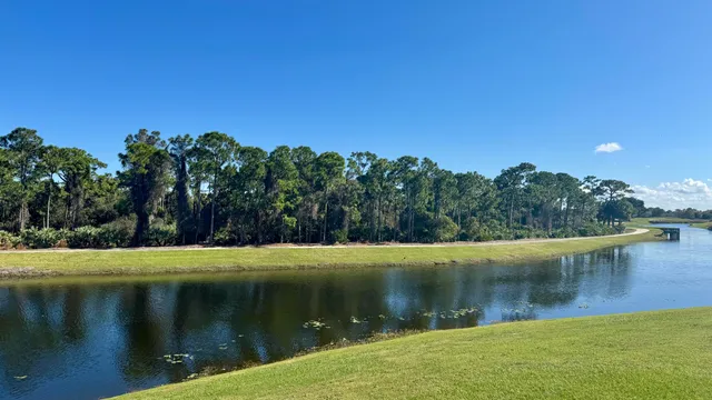a view of lake with green space